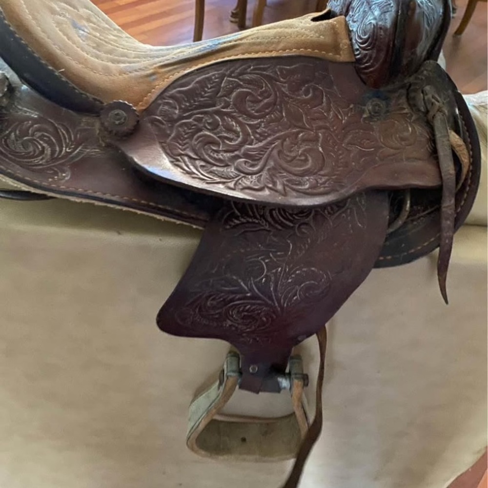 Rich Brown Saddle with Intricate Tooling and Organic Patterns